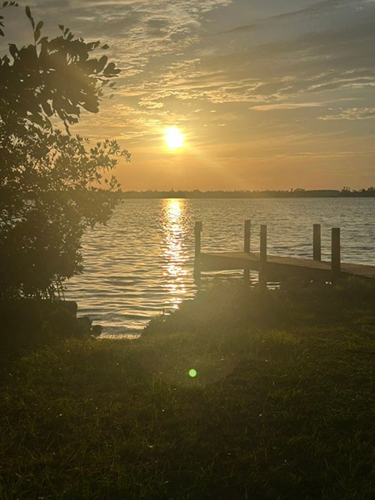 Lemon Bay and the private dock at sunrise, Gecko House