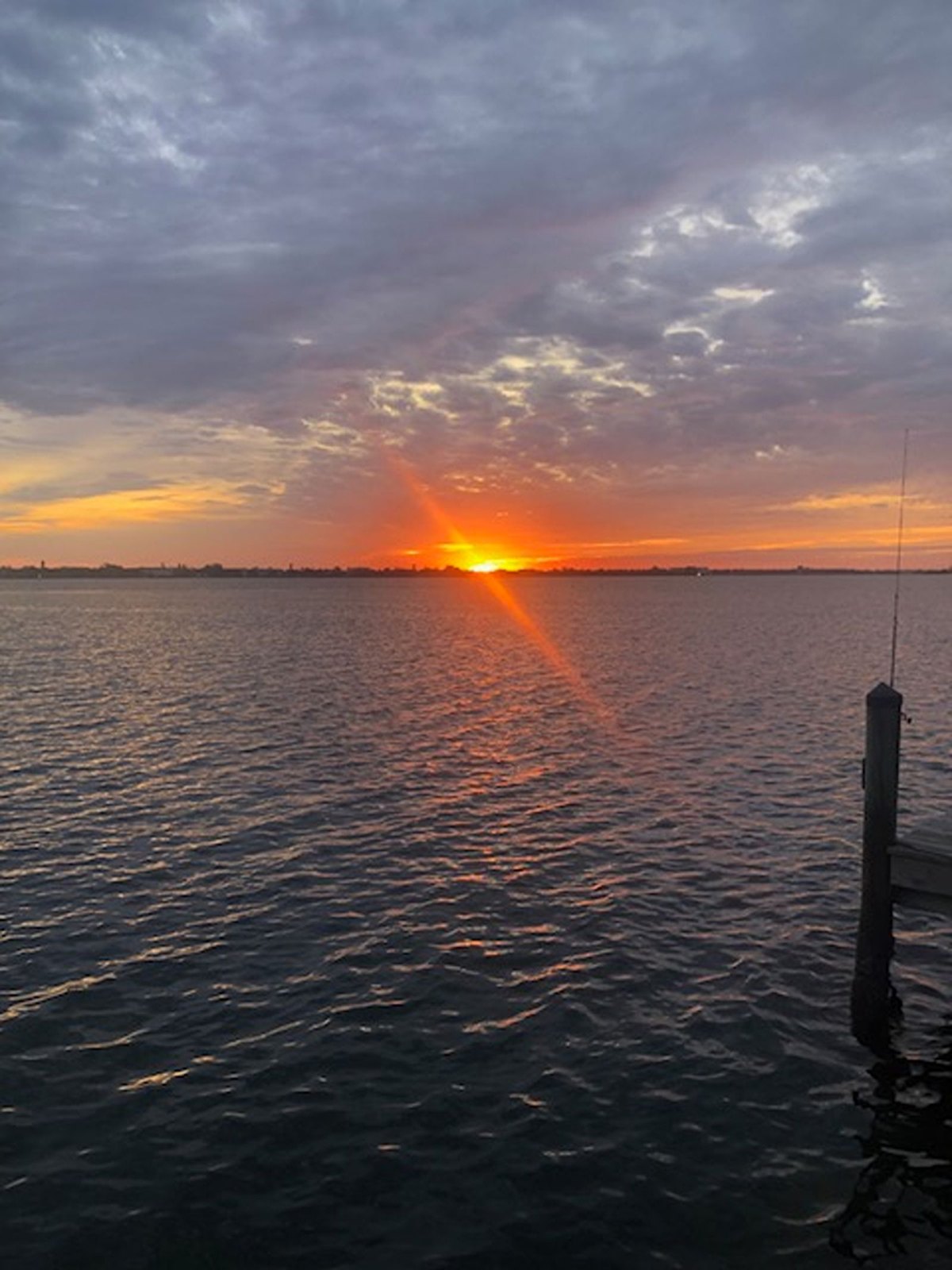 Sunrise over Lemon Bay from the private dock at Gecko House