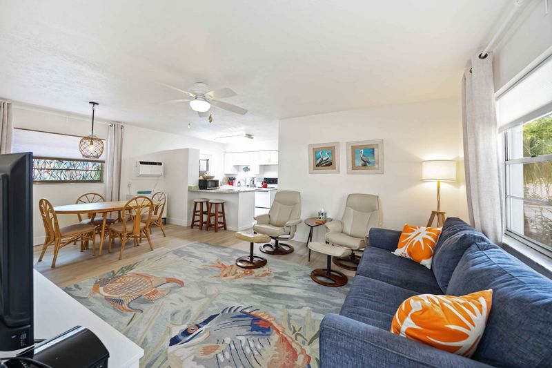 Red Gecko living and dining area at Gecko House, Manasota Key